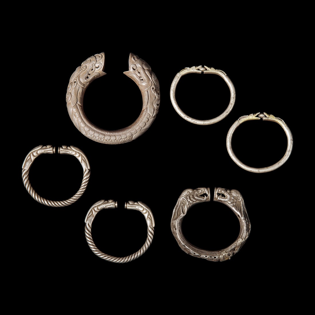 Six Chinese Silver 'Dragon' Bracelets, Qing Dynasty 清 銀龍頭紋 (1 of 4)