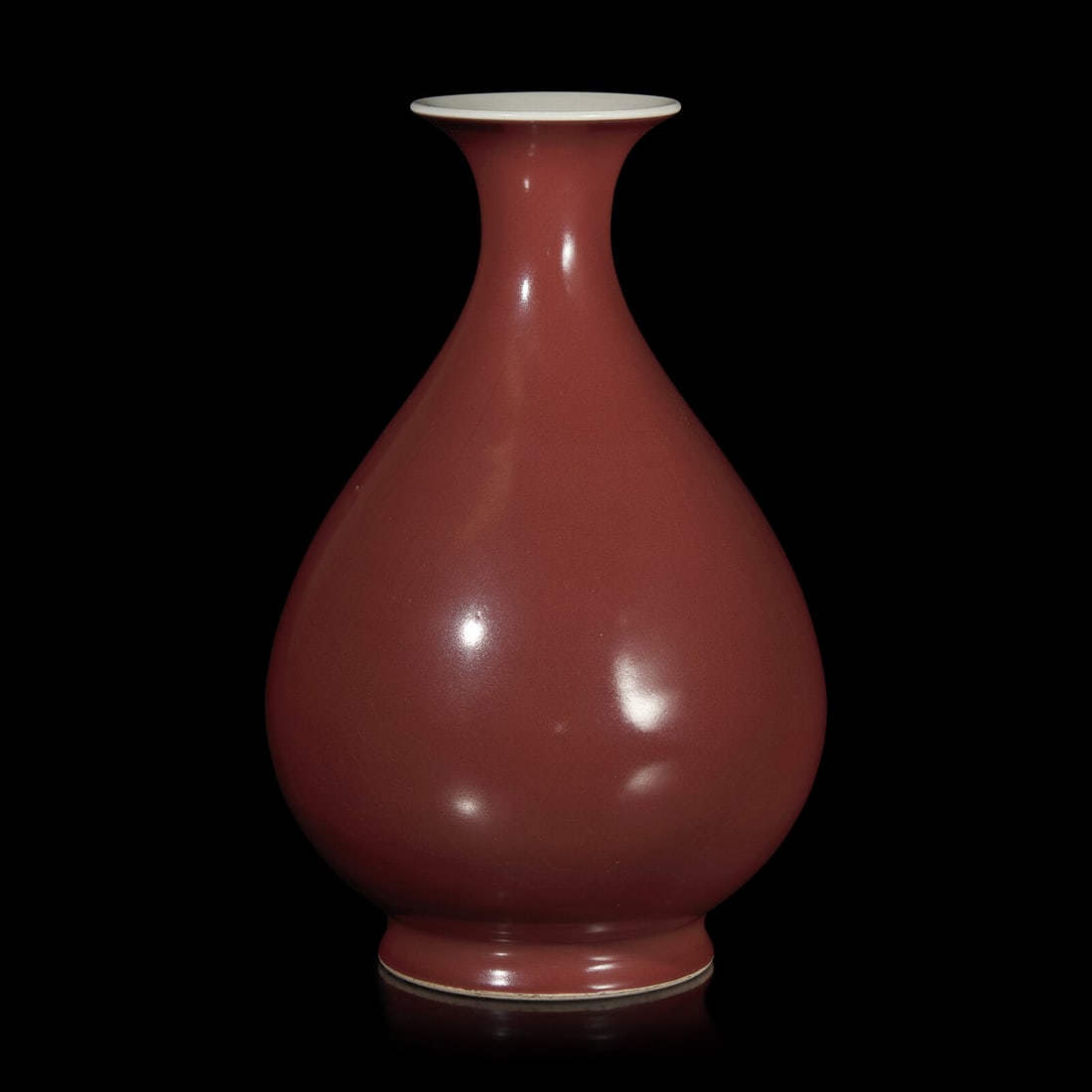 A Chinese Copper Red Glazed Pear-Shaped Vase, Yuhuchunping, Qianlong Mark and Possibly of The Period (1 of 2)