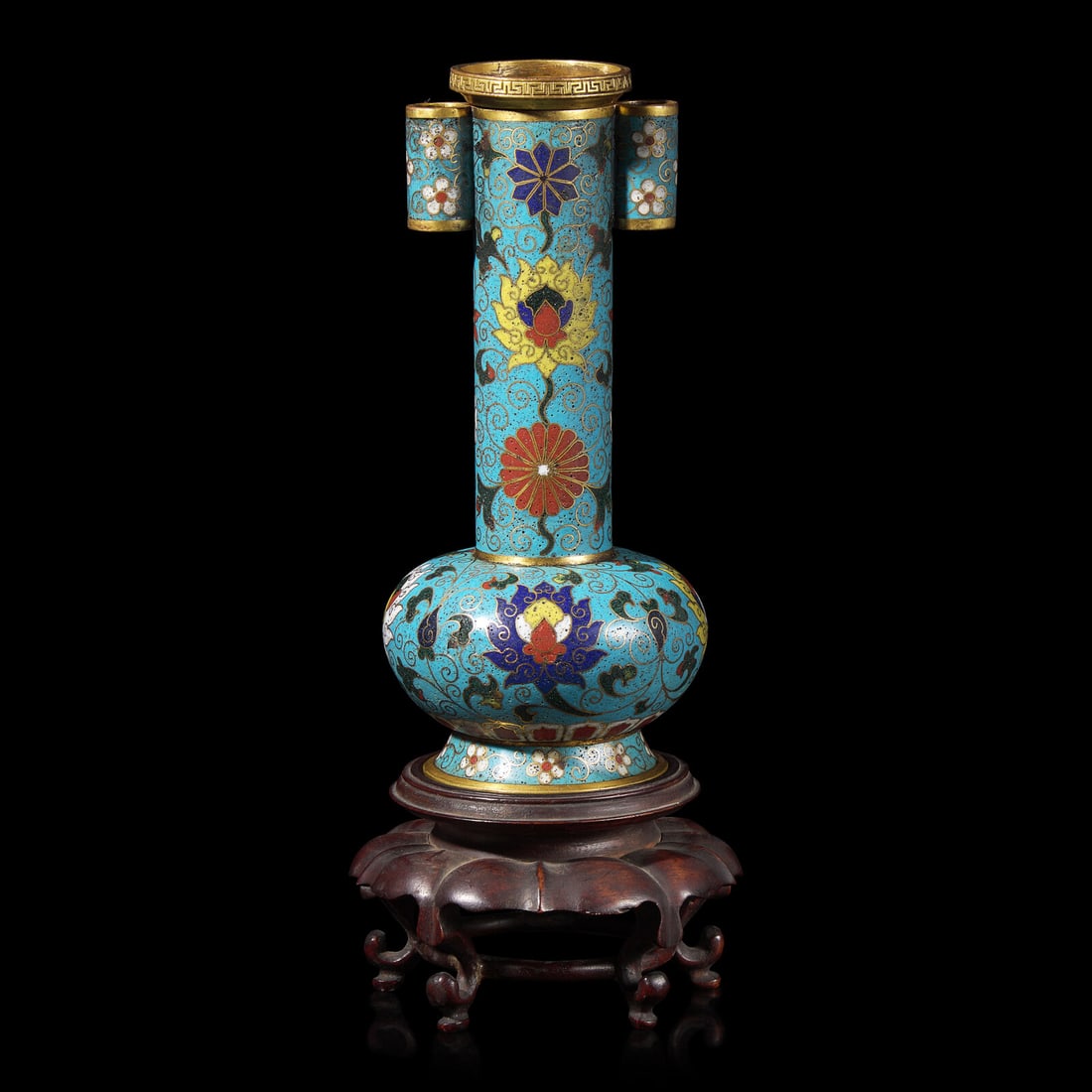 A Chinese Cloisonné Enamel Arrow Vase, Touhu 掐絲琺琅投壺: A Chinese Cloisonné Enamel Arrow Vase, Touhu 掐絲琺琅投壺 The finely-cast compressed body resting on a spreading foot, rising to a tall cylindrical neck flanke