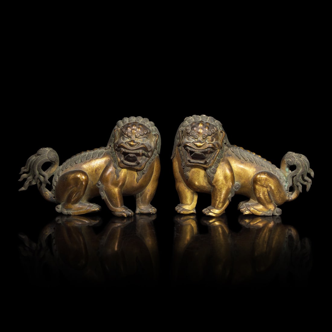 A Pair of Chinese Gilt Bronze Lion Mounts, 17th/18th Century 清中期 鎏 (1 of 3)