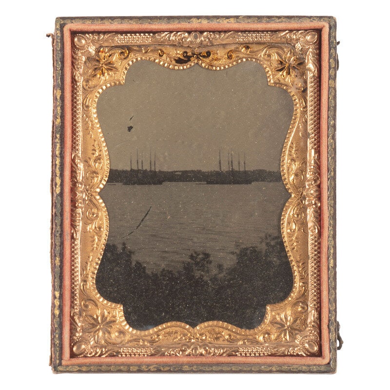 [Civil War] Quarter Plate Tintype of Federal Warships at Anchor at Bell Plain, Virginia: [Civil War] Quarter Plate Tintype of Federal Warships at Anchor at Bell Plain, Virginia Quarter plate tintype view of a group of four, three-masted warships riding at anchor with several buildings vis
