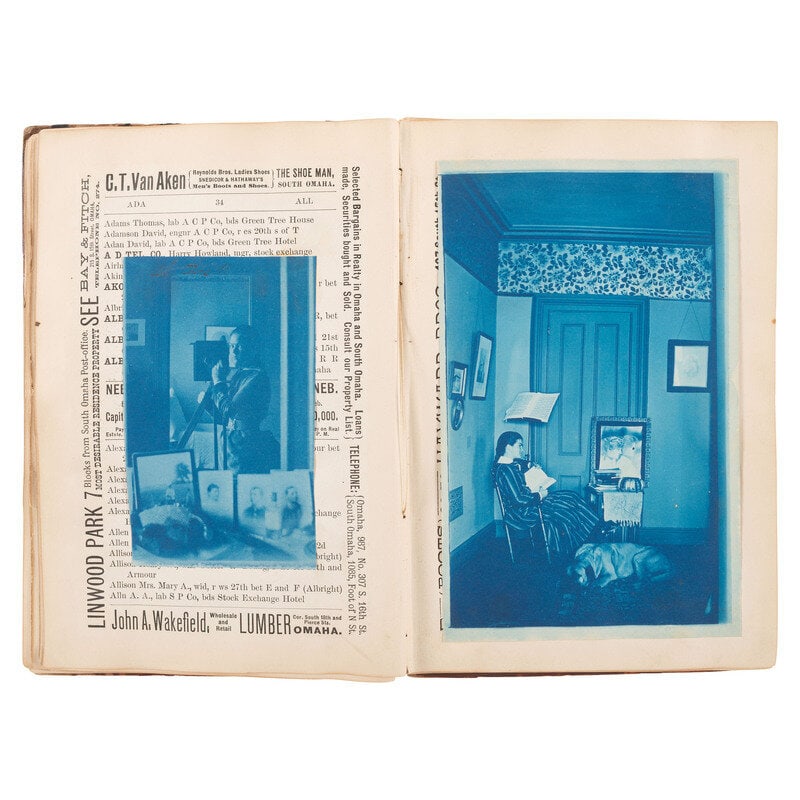 [Early Photography] Collection of 60+ cyanotypes, incl. playful and artfully posed scenes : [Early Photography] Collection of 60+ cyanotypes, incl. playful and artfully posed scenes 9 1/2 x 6 1/4 in. Omaha, Nebraska, directory repurposed as a photo album containing approx. 49 tipped in cyan