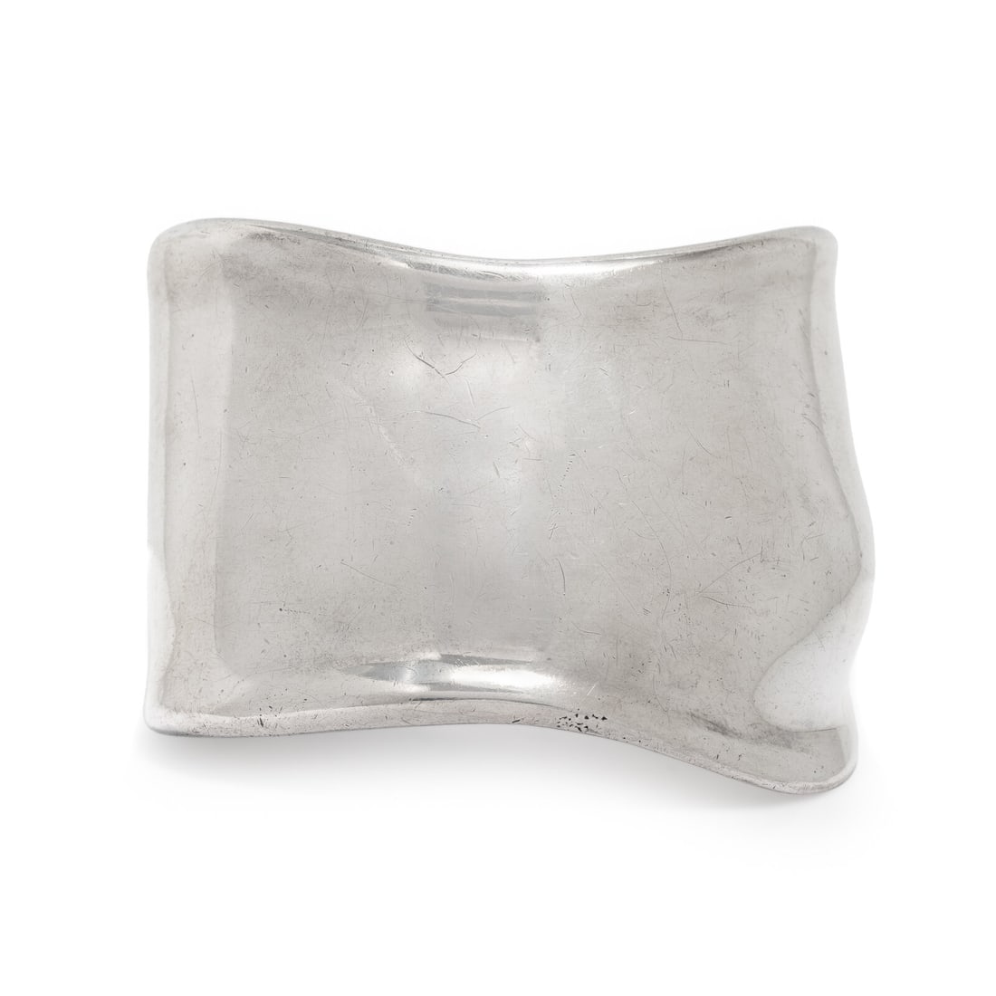 Elsa Peretti, Tiffany & Co., Sterling Silver 'Bone' Cuff: Elsa Peretti, Tiffany & Co., Sterling Silver 'Bone' Cuff Sterling silver. 6 1/4 inches inner circumference, 2 inches wide. Stamp: (maker's mark) STERLING PERETTI TIFFANY (partially obscured). Gros