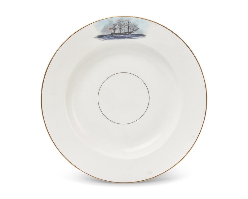 A French Porcelain Commemorative "Constitution" Soup Plate Made for the American Market: A French Porcelain Commemorative "Constitution" Soup Plate Made for the American Market Late 19th Century with red-painted accession number, "79.8." Diameter 9 1/2 inches. This lot is located in