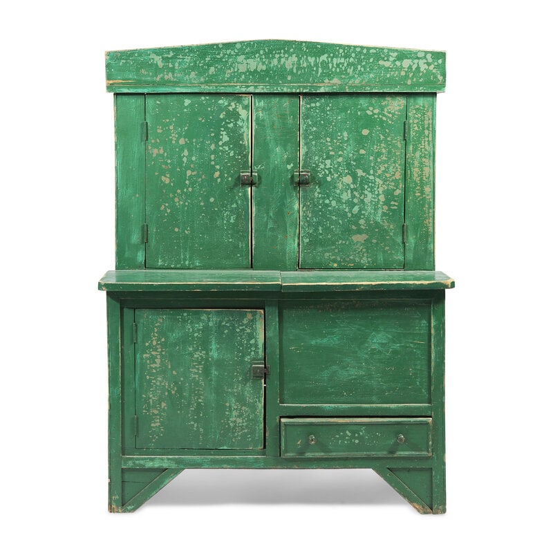A Green-Painted Stepback Cupboard: A Green-Painted Stepback Cupboard North Carolina, 19th Century in one piece, with arched pediment, over two doors revealing storage shelves, over a divided lower half composed of pie safe and grai