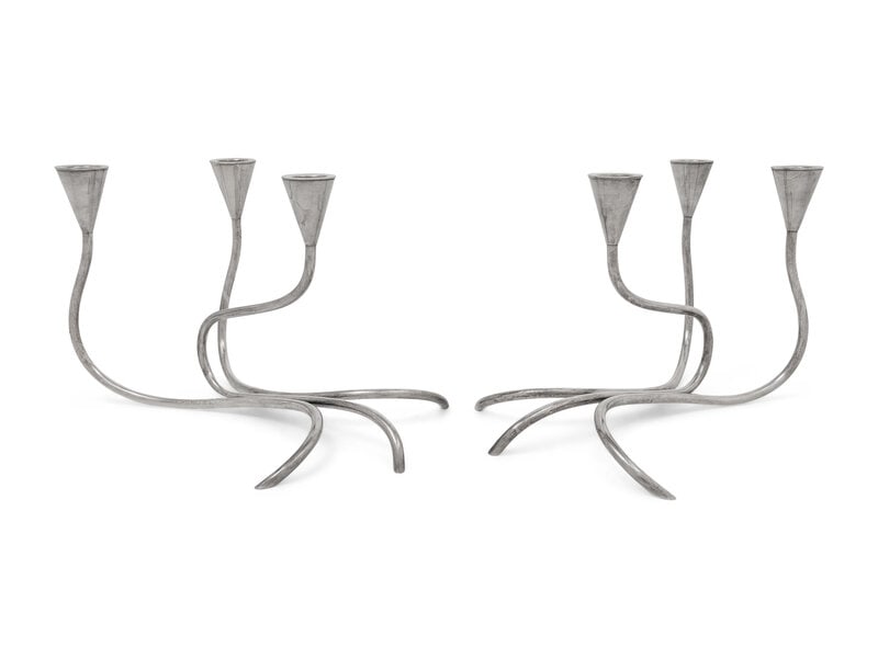 A Pair of Danish Modernist Silver-Plate Candelabra: A Pair of Danish Modernist Silver-Plate Candelabra Carl Frederik Christiansen, Mid-20th Century with maker's mark and 'P' insignia for silver-plate to underside. Height 7 1/2 x width 12 inches. 