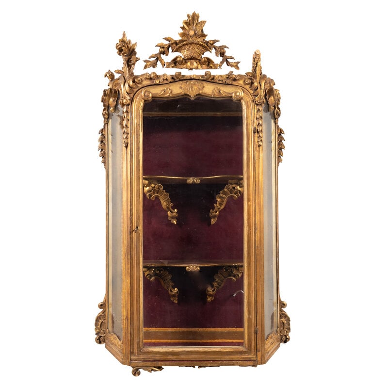 A Rococo Revival Carved Giltwood Hanging Collector's Cabinet: A Rococo Revival Carved Giltwood Hanging Collector's Cabinet Probably Italian, Second Half 19th Century Height 60 x width 34 x depth 12 inches. Property of a California Collector <