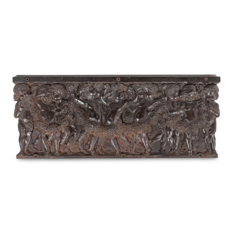 A Neoclassical Style Cast Iron Relief Panel: A Neoclassical Style Cast Iron Relief Panel Circa 1900 Depicting Bacchic putti playing music and dancing among garlands of flowers. Height 14 x width 35 1/2 inches. Property of a California Collector