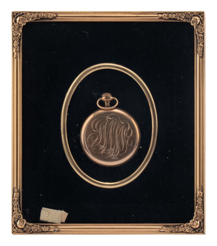 A Filled-Gold Pocket Watch: A Filled-Gold Pocket Watch Frame: 7 1/4 x 6 1/4 inches. This lot is located in Chicago. 