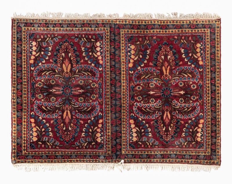 A Sarouk Mat: A Sarouk Mat 2 feet 6 inches x 3 feet 9 inches. This lot is located in Chicago. ConditionJoined from two mats sewn together. No significant damage or repairs. Normal signs of wear from use. Would