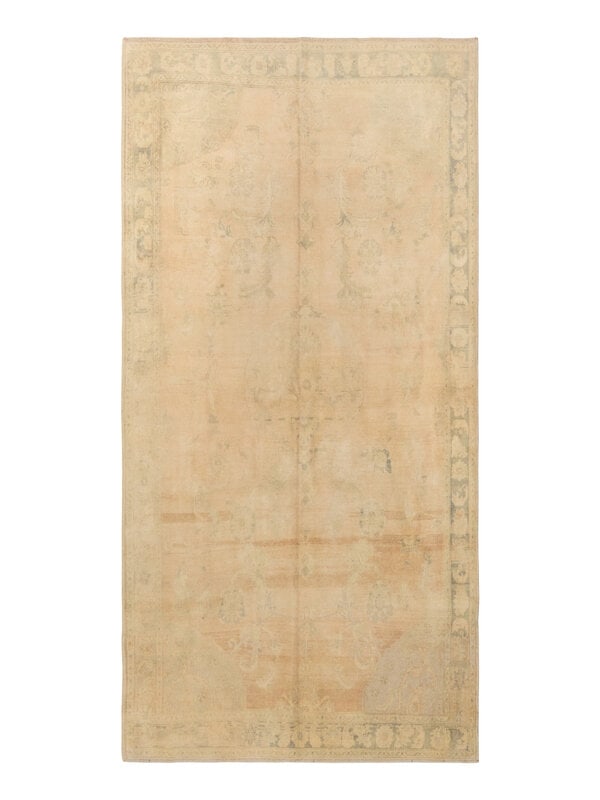 An Oushak Rug: An Oushak Rug 9 feet x 5 feet 8 inches. Property from a Private Family Trust This lot is located in Chicago. ConditionChemically washed to neutralize the original colors. Otherwise stable and ready