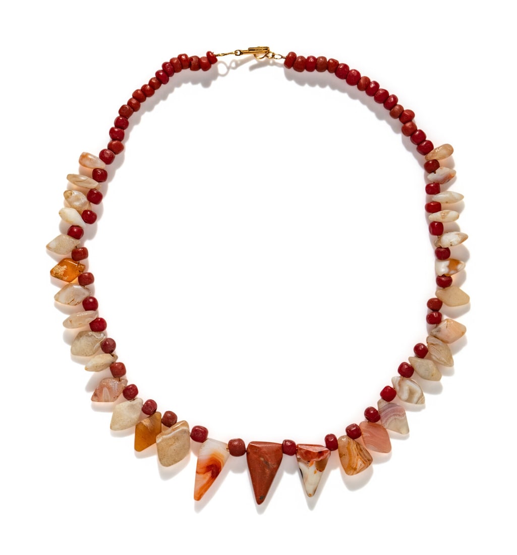 A Western Asiatic Carnelian and Red Jasper Necklace: A Western Asiatic Carnelian and Red Jasper Necklace Circa 3rd-2nd Millennium B.C. Length 46.5 cm (18 1/4 inches). Property from a Brooklyn Private Collection Provenance: Private Collection,