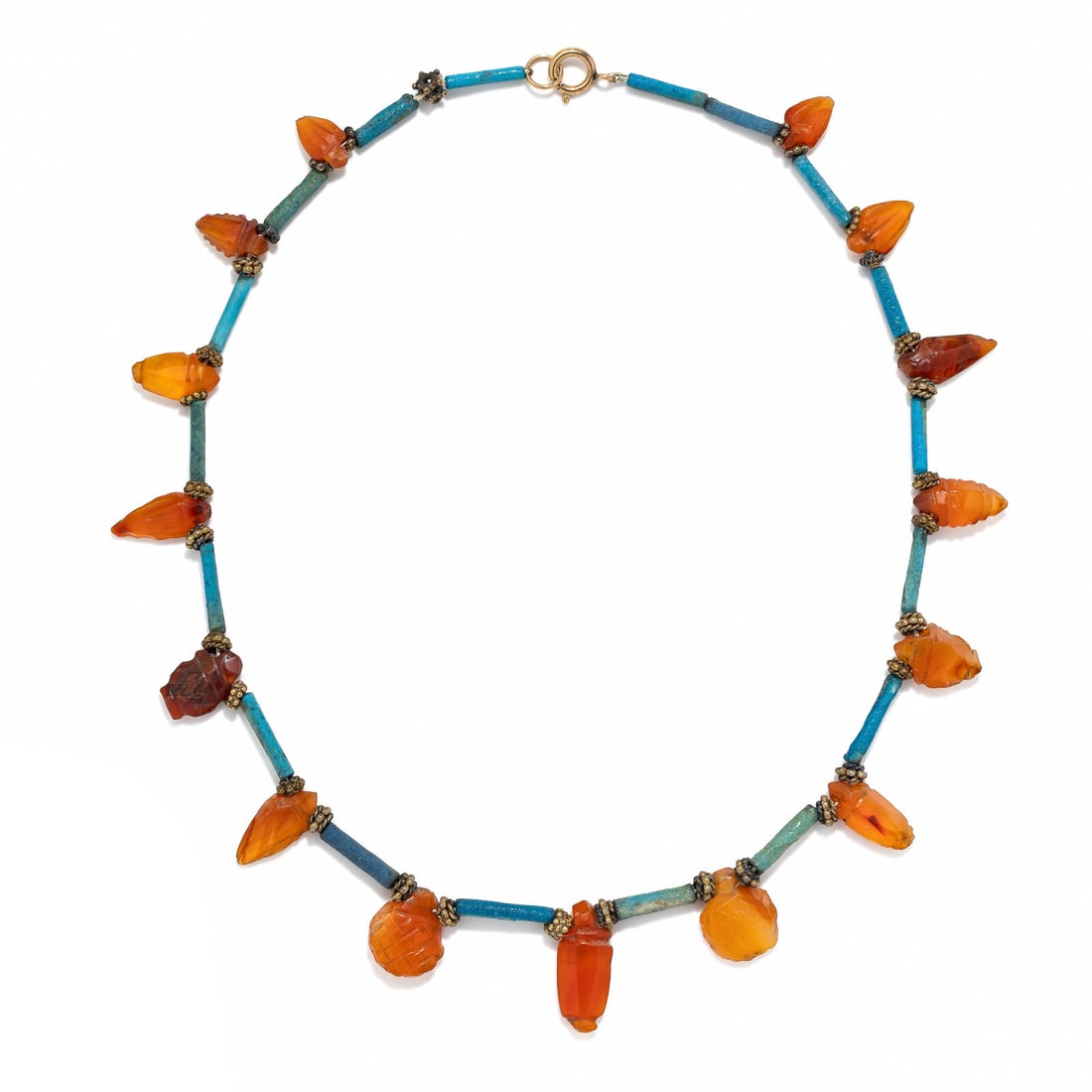 An Egyptian Carnelian and Faience Bead Necklace: An Egyptian Carnelian and Faience Bead Necklace New Kingdom, 18th-20th Dynasty, 1550-1070 B.C. Length 43 cm (16 7/8 inches);14 karat gold; 20.78 grams. Provenance: Andrew Cunningham Ware Collection (1