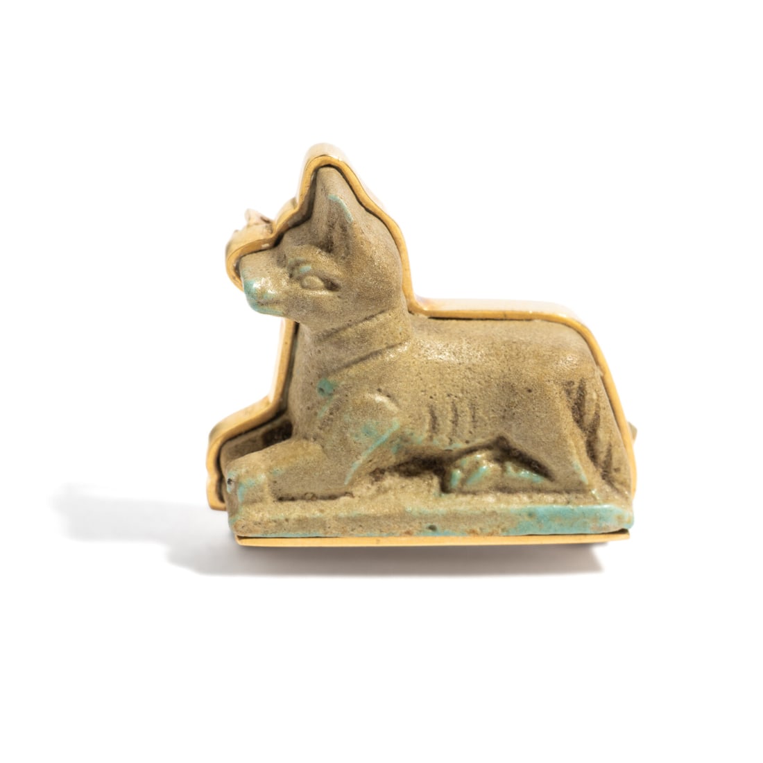 An Egyptian Faience Jackal: An Egyptian Faience Jackal Set in a gold brooch Late Period to Ptolemaic Period, 664-30 B.C. Width of brooch 2.9 cm (1 1/8 inches); 14 karat gold; 13 grams. Provenance: Andrew Cunningham Ware Collecti