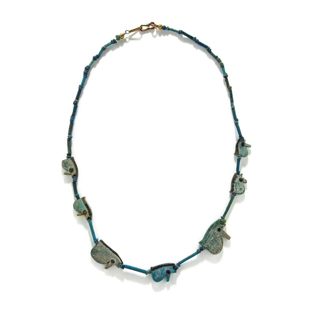 An Egyptian Faience Necklace with Uzats: An Egyptian Faience Necklace with Uzats Late Period, 26th-30th Dynasty, 664-343 B.C. Length 56.5 cm (22 1/4 inches). Property from a New England Collection Provenance: Stafford Collection, New