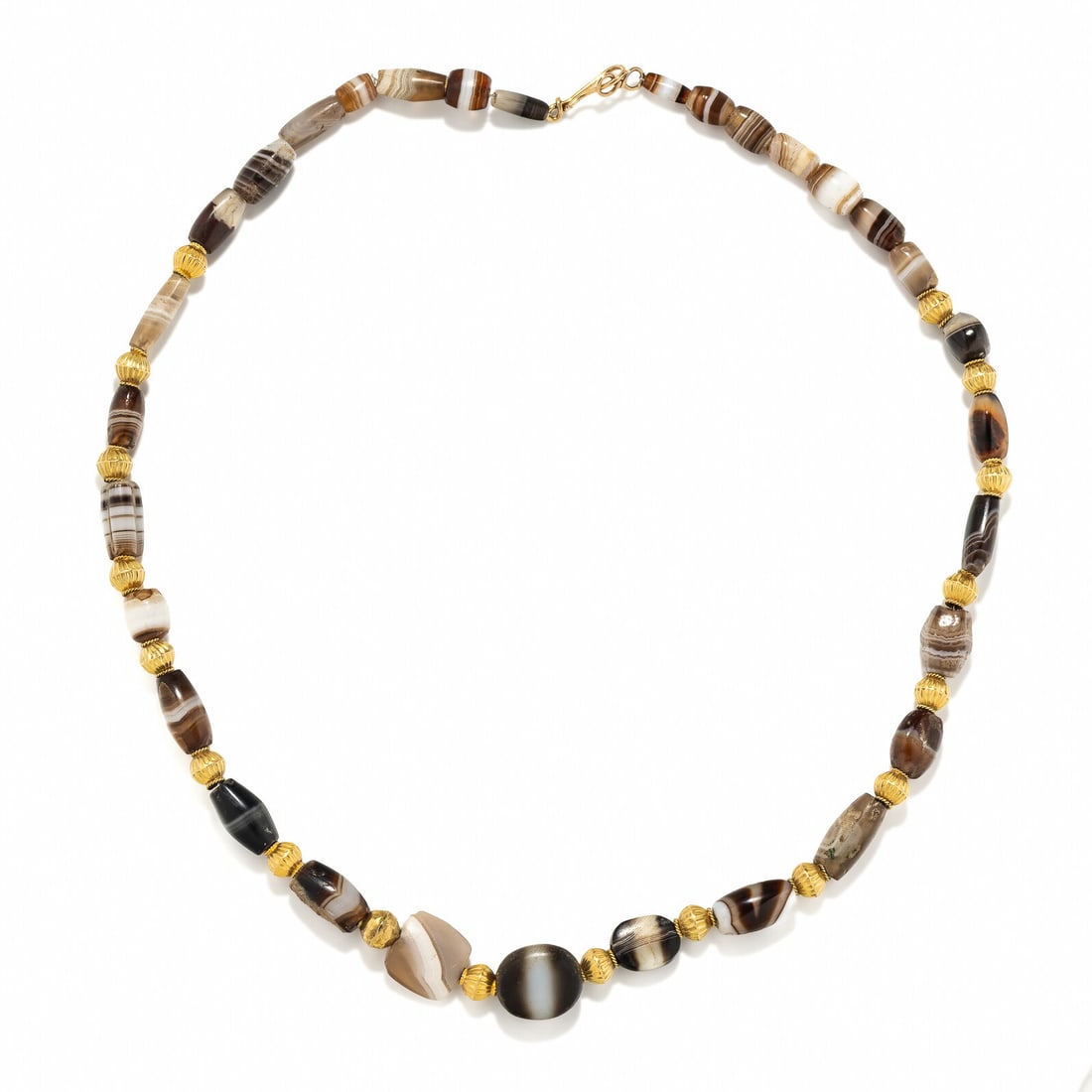 A Near Eastern Gold and Banded Agate Bead Necklace (1 of 2)