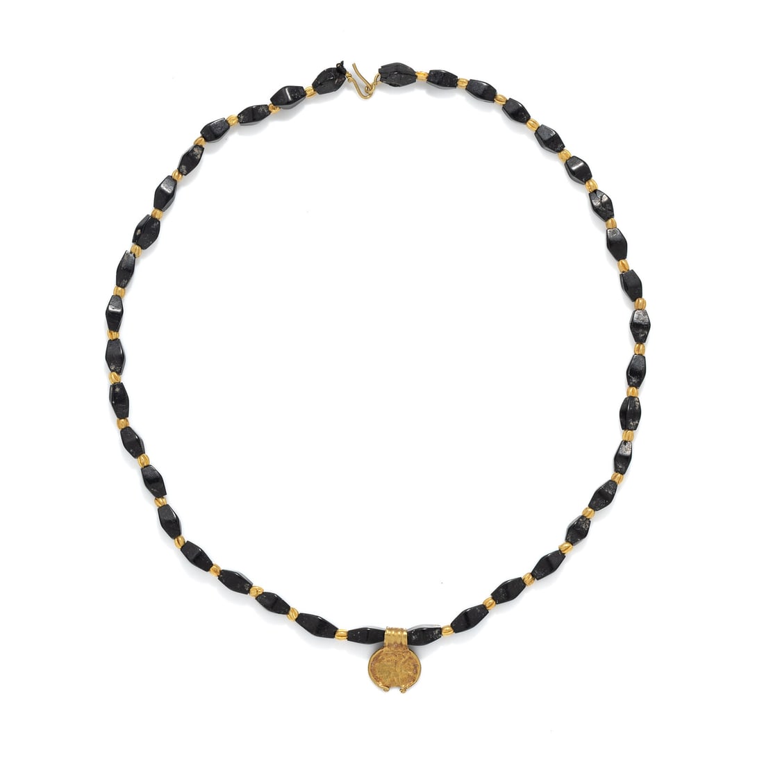 A Roman Gold Lunette Pendant: A Roman Gold Lunette Pendant Strung with gold spacers and modern beads Circa 1st-3rd Century A.D. Length 44.5 cm (17 1/2 inches); High karat gold; 8.08 grams. Provenance: Private Collection, Bergen Co