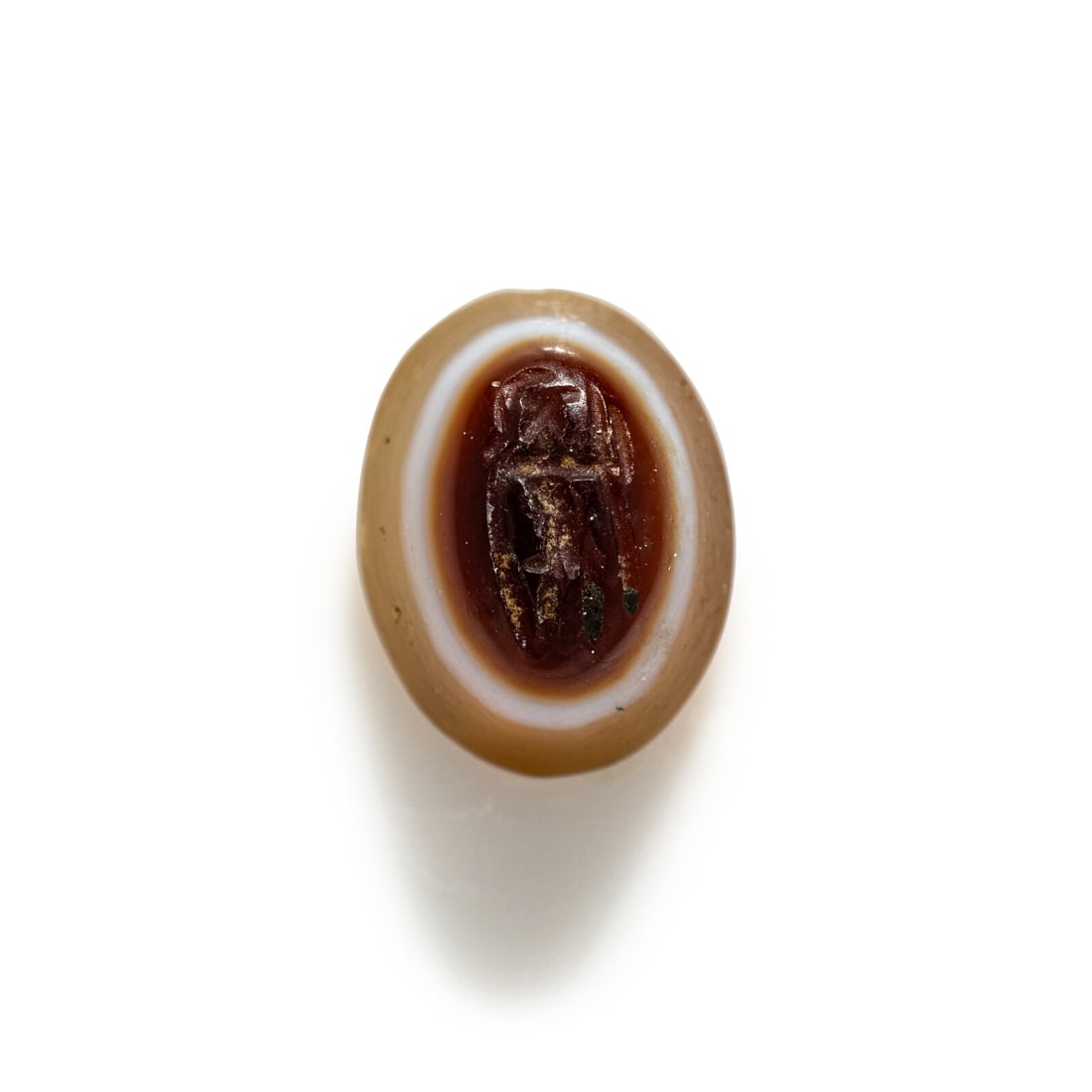 A Roman Banded Agate Ring Stone with a Standing Figure: A Roman Banded Agate Ring Stone with a Standing Figure Circa 3rd Century A.D. Length 0.8 cm (3/8 inch). Provenance: Private Collection, New York, 2000s.