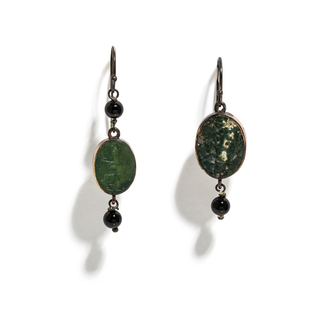 Two Roman Green Jasper Ring Stones: Two Roman Green Jasper Ring Stones Set in silver earrings Circa 2nd Century A.D. Height of larger 4.3 cm (1 3/4 inches); 14 karat gold; 3.07 grams. Provenance: Lee Kieffer Collection, Loudon, Tennesse