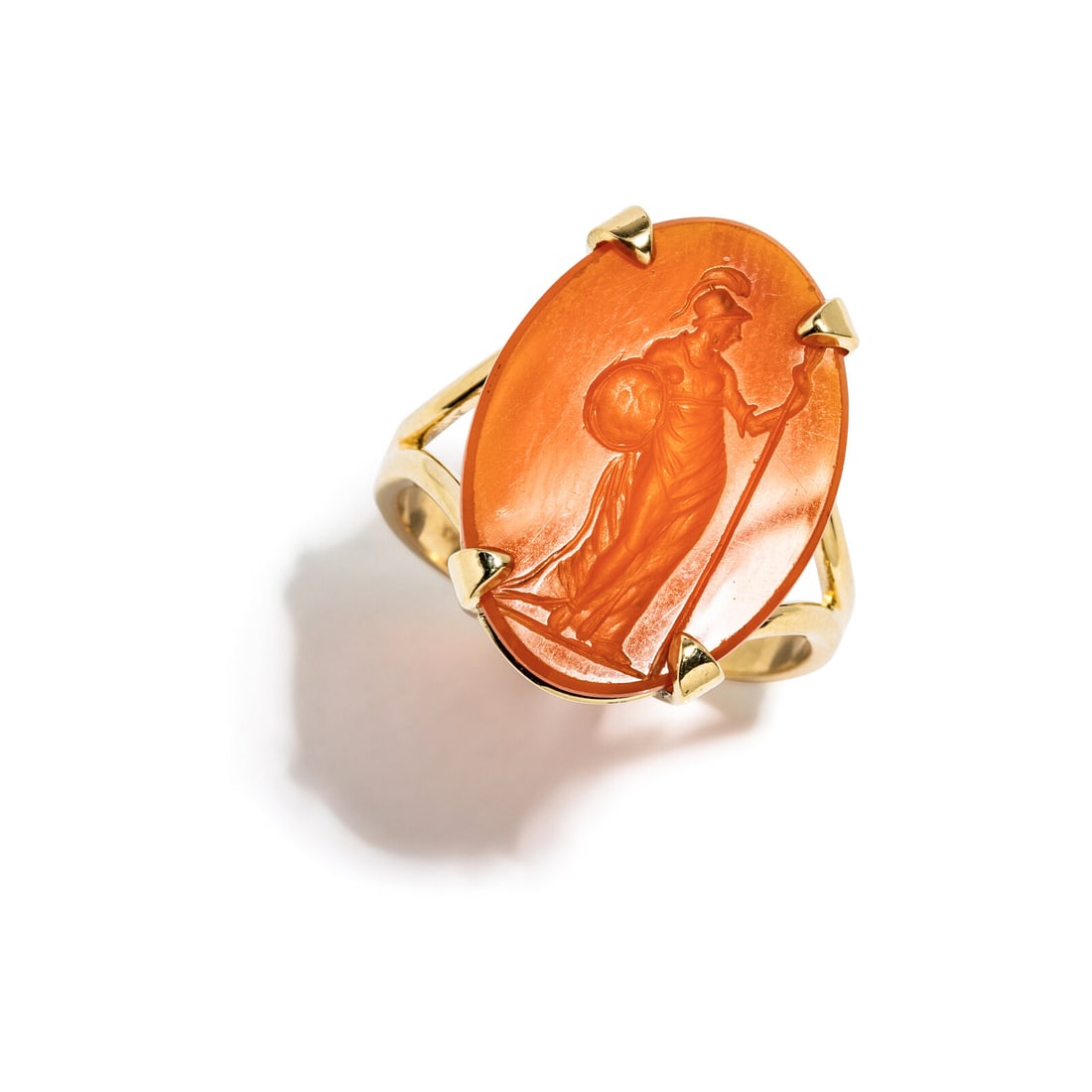 A Roman Carnelian Ring Stone with the Goddess Athena: A Roman Carnelian Ring Stone with the Goddess Athena Set in a gold ring Circa 1st-2nd Century A.D. Height 2.7 cm (1 1/8 inches); Ring size 9 1/2; 14 karat gold; 6.75 grams. Provenance: Lee Kieffer