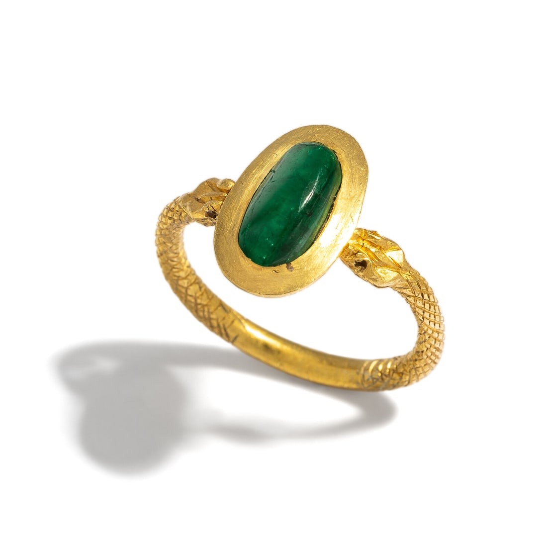 A Hellenistic Gold and Emerald Snake Ring: A Hellenistic Gold and Emerald Snake Ring Circa 1st Century B.C. Height 2.2 cm (7/8 inch); Ring size 5 3/4; High karat gold; 3.8 grams. Provenance: Private Collection, Bergen County, New Jersey,