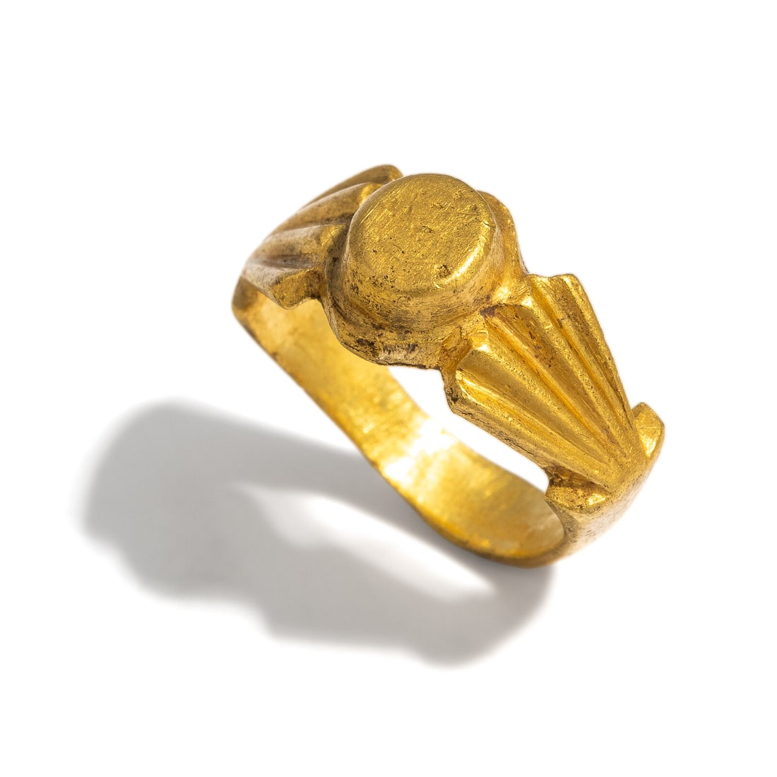 A Roman Gold Finger Ring: A Roman Gold Finger Ring Circa 3rd Century A.D. Width 2 cm (3/4 inch); Ring size 3 1/2; High karat gold; 7.48 grams. Provenance: Fortuna Fine Arts, New York, 1998 (The Gift of the Gods: Jewelry From t