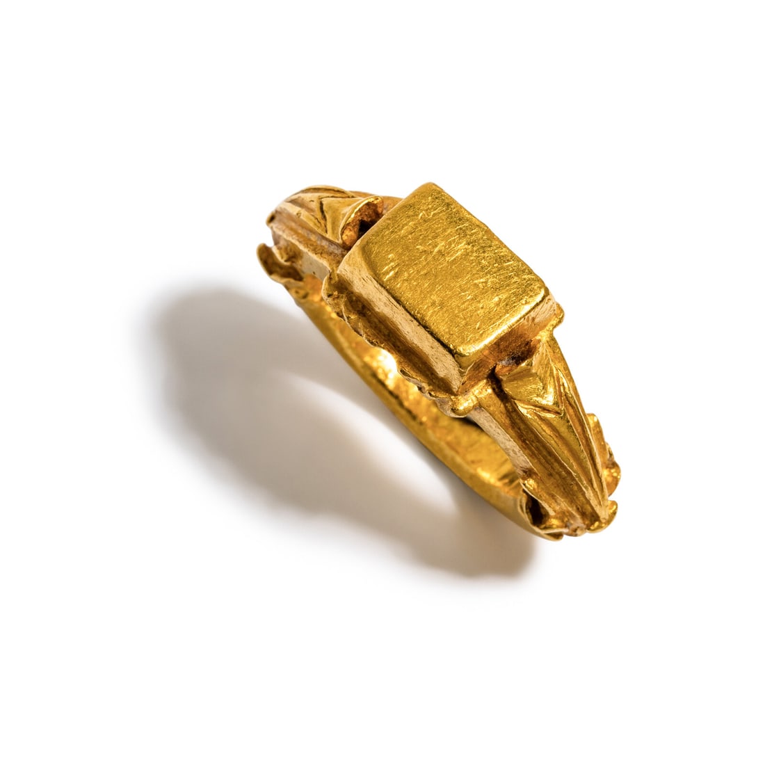 A Roman Gold Ring: A Roman Gold Ring Circa 4th Century A.D. Width 3.2 cm (1 1/4 inches); Ring size 8 1/2; High karat gold; 34 grams. Property from a Florida Private Collection Provenance: Richard Trescott, London. Peter