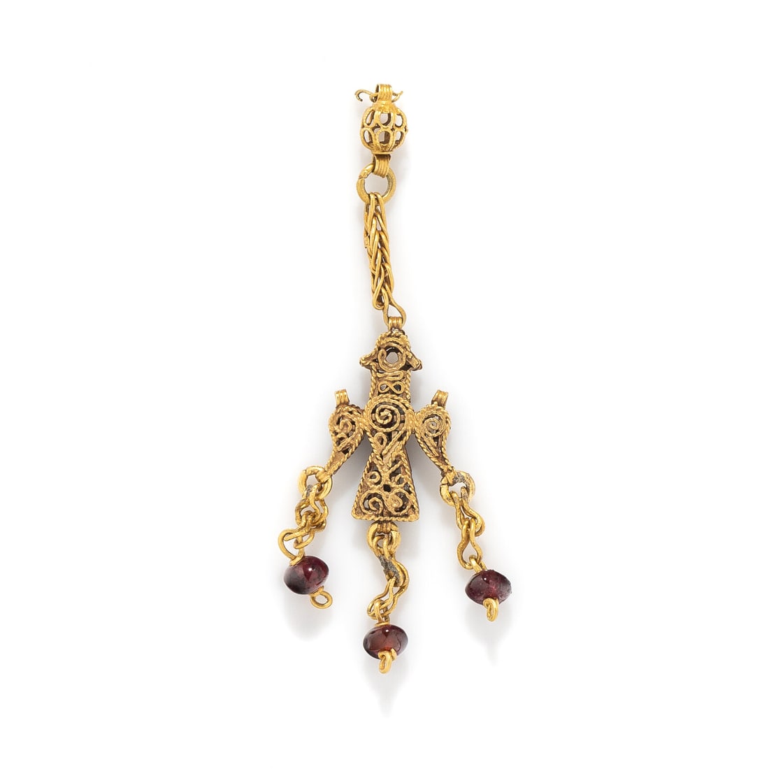 A Byzantine or Islamic Gold and Garnet Pendant: A Byzantine or Islamic Gold and Garnet Pendant Circa 8th-12th Century A.D. Height 5.5 cm (2 1/8 inches); High karat gold; 2.48 grams. Provenance: Private Collection, Bergen County, New Jersey,