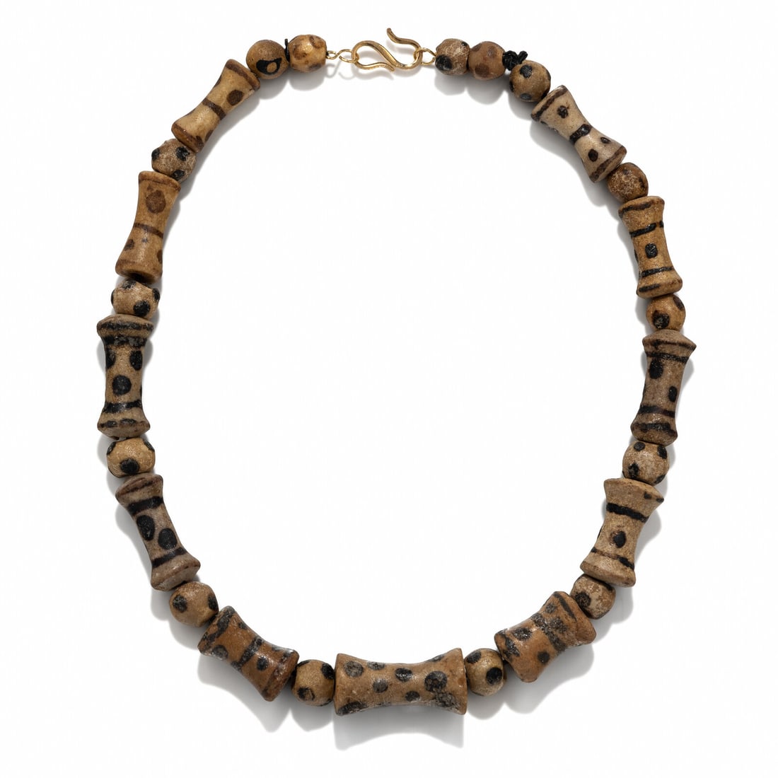 An Islamic Glass Bead Necklace: An Islamic Glass Bead Necklace Circa 11th-14th Century A.D. Length 44 cm (17 3/8 inches). Property from a Private Brooklyn Collection Provenance: Kay Serhal (1930-2023), New York, acquired in the