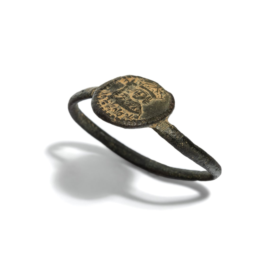 A French Bronze Ring with a Bust of a King: A French Bronze Ring with a Bust of a King Circa 14th Century A.D. Width 2.4 cm (1 inch); Ring size 4. Provenance: Art Market, New York, 2000s.