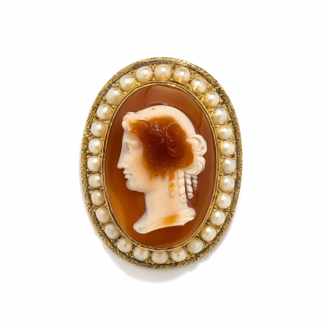 A Neoclassical Gold, Pearl, and Sardonyx Cameo Brooch: A Neoclassical Gold, Pearl, and Sardonyx Cameo Brooch Circa 19th Century A.D. Height 5.5 cm (2 1/8 inches); High karat gold; 25.6 grams. Provenance: Hartley Brown LLC, New York, 2000s. Fortuna