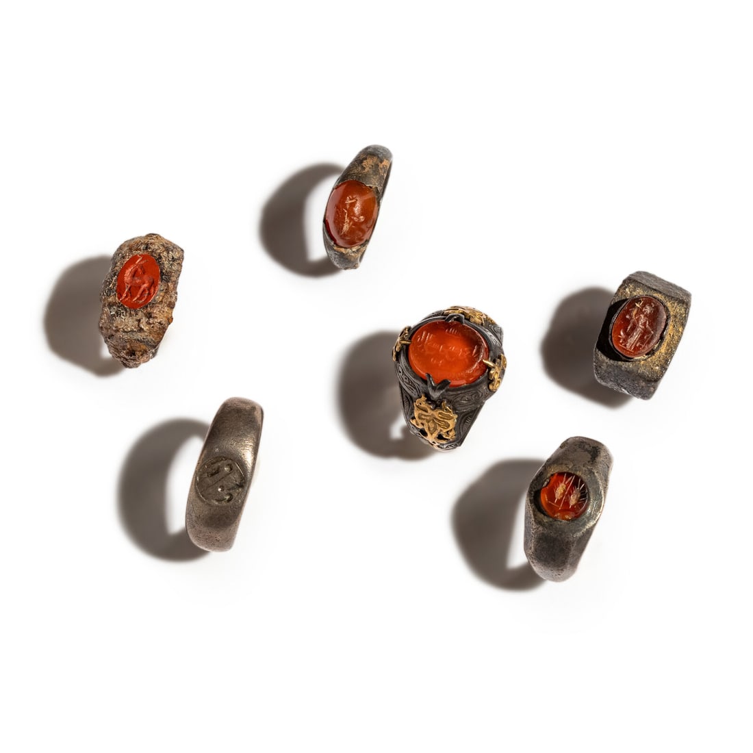 Five Bronze and Stone Finger Rings: Five Bronze and Stone Finger Rings Height of largest 2.8 cm (1 1/8 inches); Ring size 9.