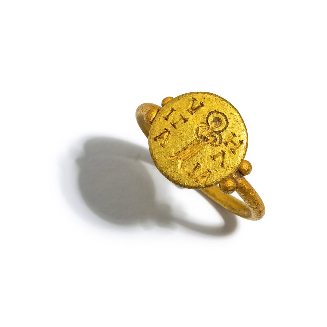 A Byzantine Style Gold Finger Ring: A Byzantine Style Gold Finger Ring After the Antique Width 2.4 cm (1 inch); Ring size 8 1/4; High karat gold; 8 grams. Property from the Collection of Mr. Felix Brejente, Schaumburg, Illinois 