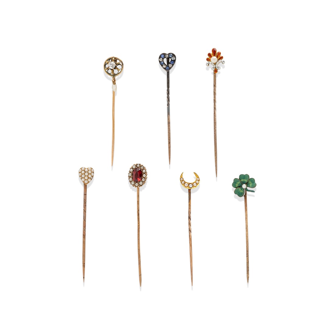VICTORIAN, COLLECTION OF SEVEN MULTIGEM STICK PINS: VICTORIAN, COLLECTION OF SEVEN MULTIGEM STICK PINS Including seven stick pins, variously set with colored stones, enamel, seed pearls, and diamonds. Yellow and rose gold. 2 inches long. Gross weight: