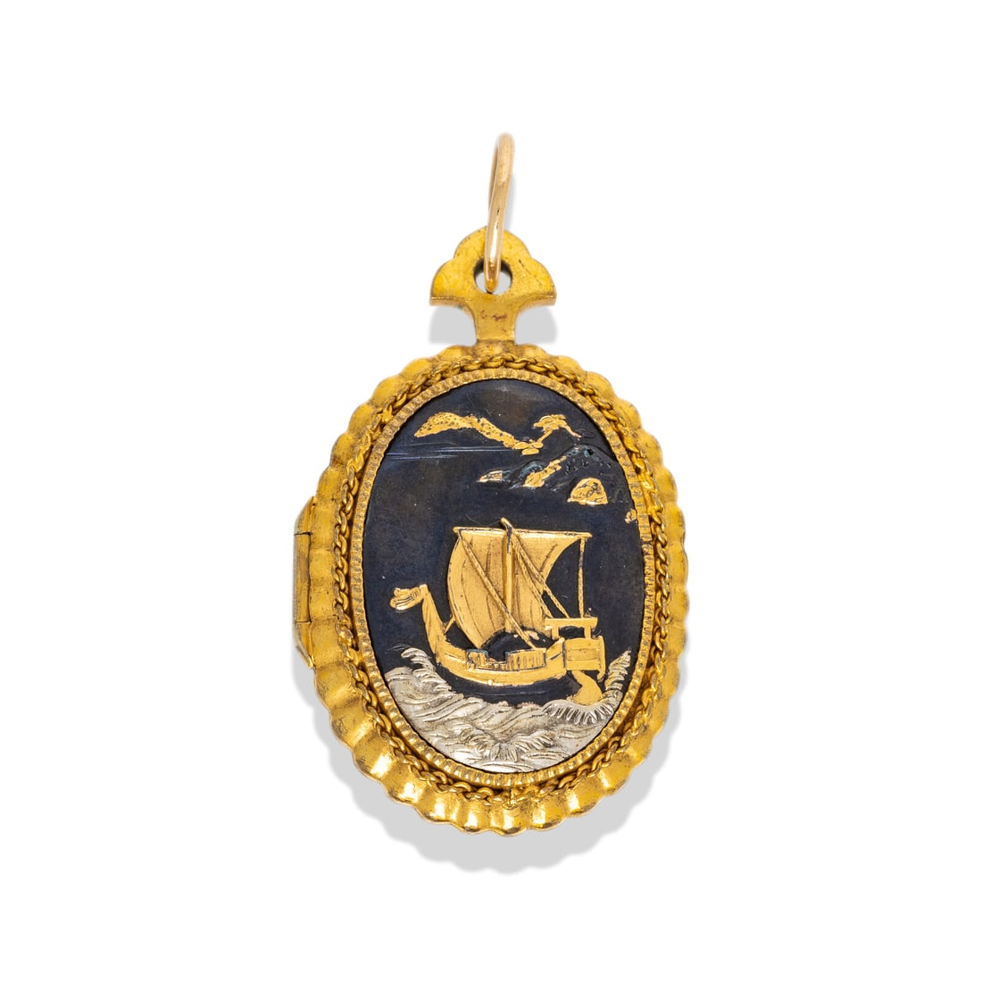 VICTORIAN, YELLOW GOLD AND MIXED METAL LOCKET: VICTORIAN, YELLOW GOLD AND MIXED METAL LOCKET Blackened metal and yellow gold. 1 5/8 x 1 inches. Gross weight: 13.40 dwt. Property from the Estate of Mrs. Joan S. Kanof, New York, New York This lot is