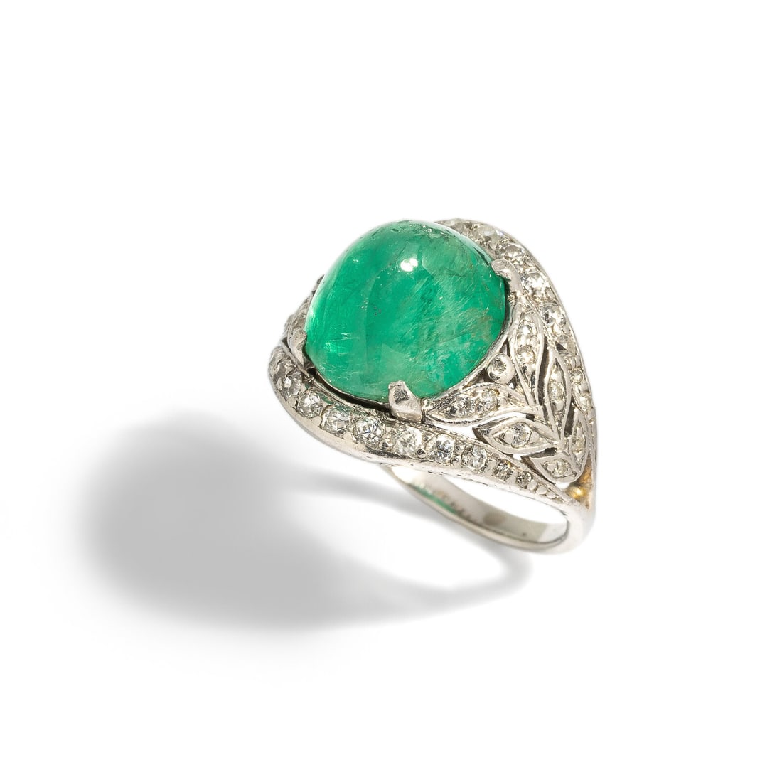 ART DECO, EMERALD, DIAMOND, AND PLATINUM RING: ART DECO, EMERALD, DIAMOND, AND PLATINUM RING Sugarloaf cabochon emerald weighing approximately 4.90 carats by formula and old European cut diamonds. Platinum. Ring size 4 1/2. Gross weight: 4.40