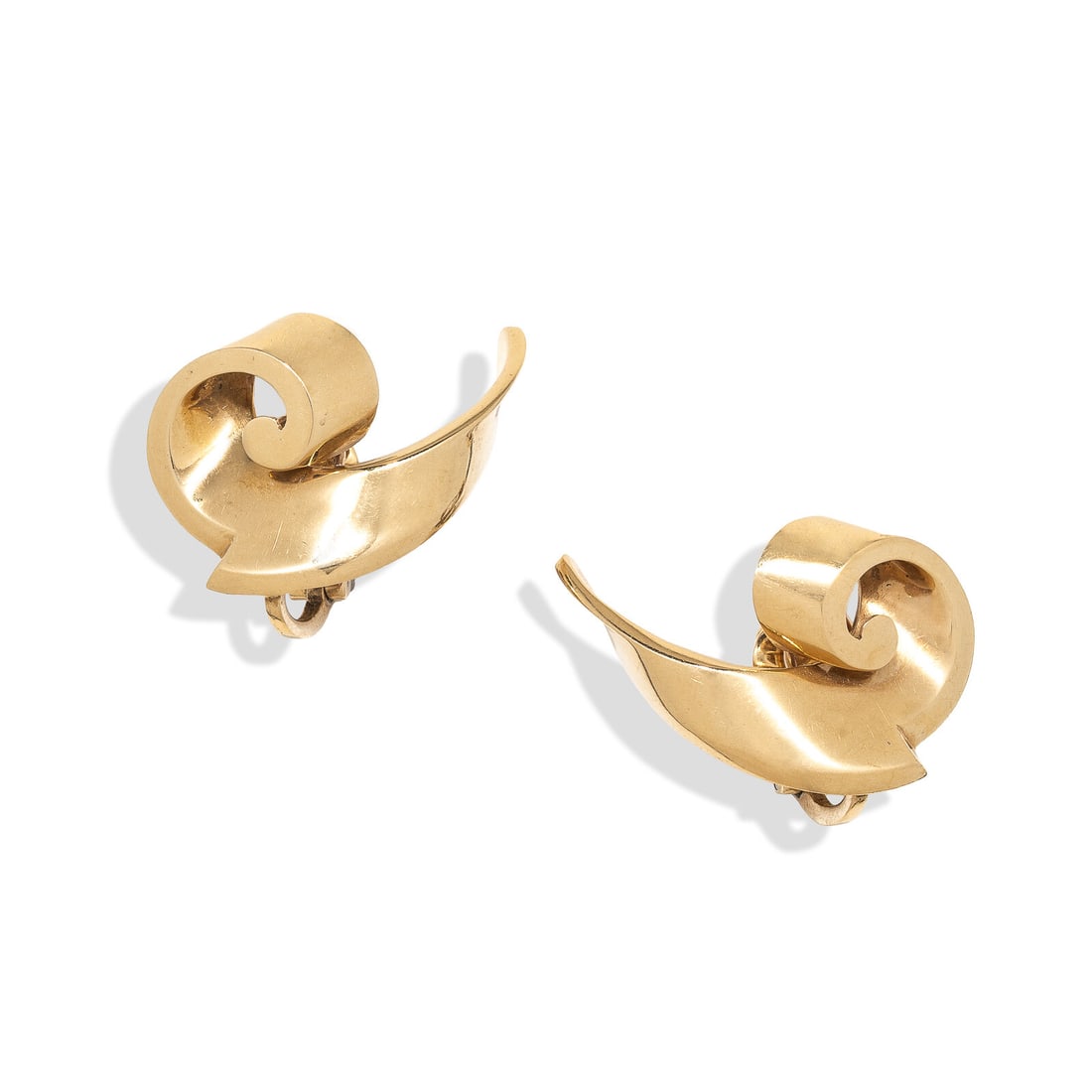 TRABERT & HOEFFER-MAUBOUSSIN, YELLOW GOLD EARRINGS: TRABERT & HOEFFER-MAUBOUSSIN, YELLOW GOLD EARRINGS Yellow gold. 1 1/8 inches wide. Stamp: T&HM. Gross weight: 6.15 dwt. Property of a Prominent Chicago Family This lot is located in Chicago.