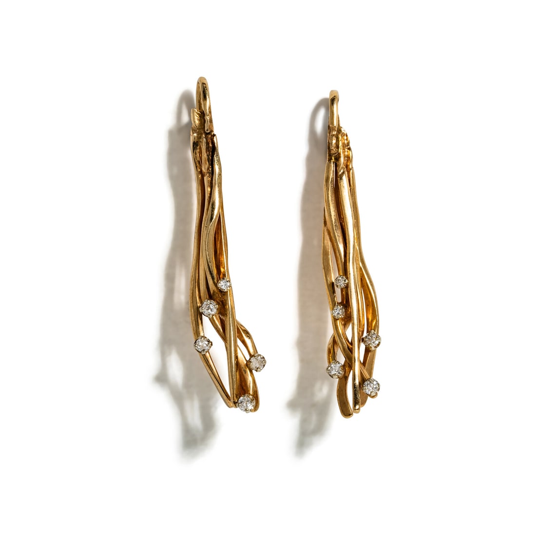 FREDRICK PRETE, YELLOW GOLD AND DIAMOND PENDANT EARRINGS: FREDRICK PRETE, YELLOW GOLD AND DIAMOND PENDANT EARRINGS Old European, old mine, and single cut diamonds. 14 karat yellow gold. 1 3/4 inches long. Engraved: PRETE 14K. Gross weight: 5.65 dwt.