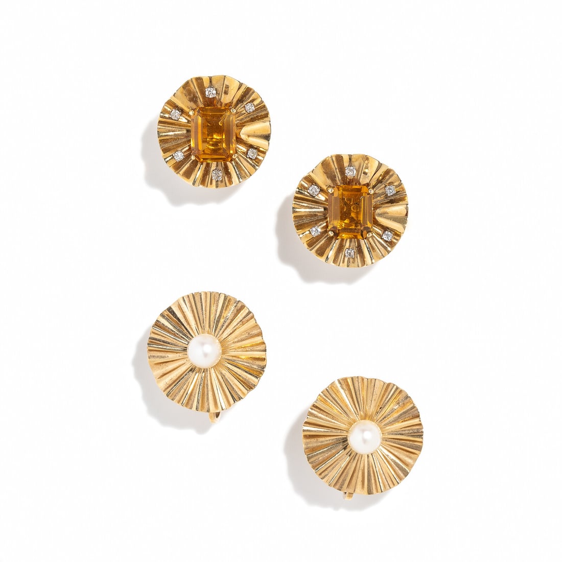 TWO PAIRS OF YELLOW GOLD AND MULTIGEM EARRINGS: TWO PAIRS OF YELLOW GOLD AND MULTIGEM EARRINGS Two pairs of earrings, one set with emerald cut citrines and single cut diamonds, and the other set with cultured pearls. Yellow gold and 14 karat