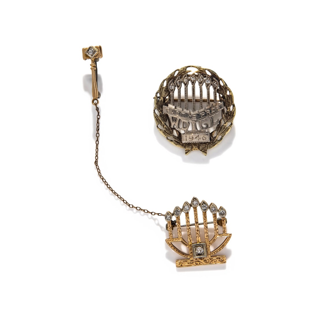 TWO GOLD AND DIAMOND MENORAH PINS: TWO GOLD AND DIAMOND MENORAH PINS Including two pins, one set with single cut diamonds and the other set with single cut diamonds and an old European cut diamond. 14 karat yellow gold. 7/8 x 7/8