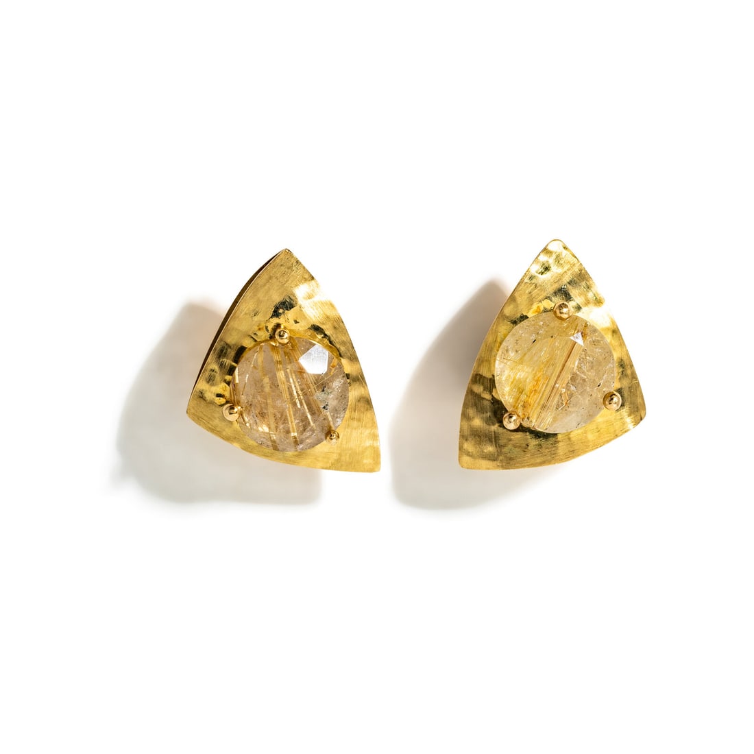 YELLOW GOLD AND RUTILATED QUARTZ EARRINGS: YELLOW GOLD AND RUTILATED QUARTZ EARRINGS Round rutilated quartz measuring approximately 13.88 x 13.87 mm. 18 karat gold. 1 1/8 inches long. Engraved: 18K (maker's mark). Gross weight: 10.05 dwt.