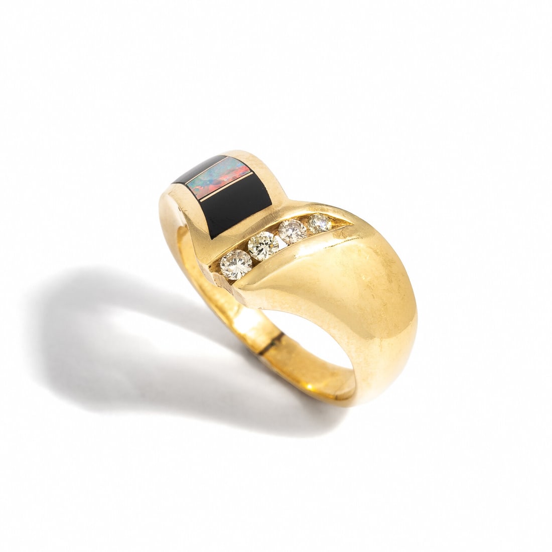 YELLOW GOLD, DIAMOND, ONYX, AND OPAL RING: YELLOW GOLD, DIAMOND, ONYX, AND OPAL RING Round diamonds, and black onyx and opal inlay. 14 karat yellow gold. Ring size 5 1/4. Stamp: 14K. Gross weight: 3.90 dwt. Property of a Florida Collector