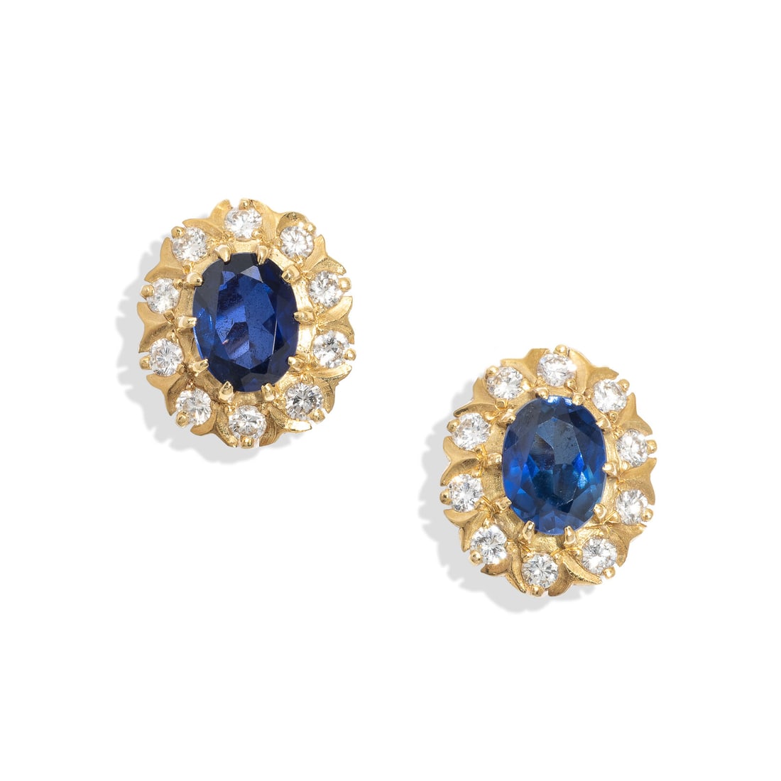 SYNTHETIC SAPPHIRE AND DIAMOND EARRINGS: SYNTHETIC SAPPHIRE AND DIAMOND EARRINGS Oval synthetic sapphires weighing approximately 2.20 carats total by formula and round diamonds weighing approximately 0.90 carat total. Yellow gold. 1/2 inch