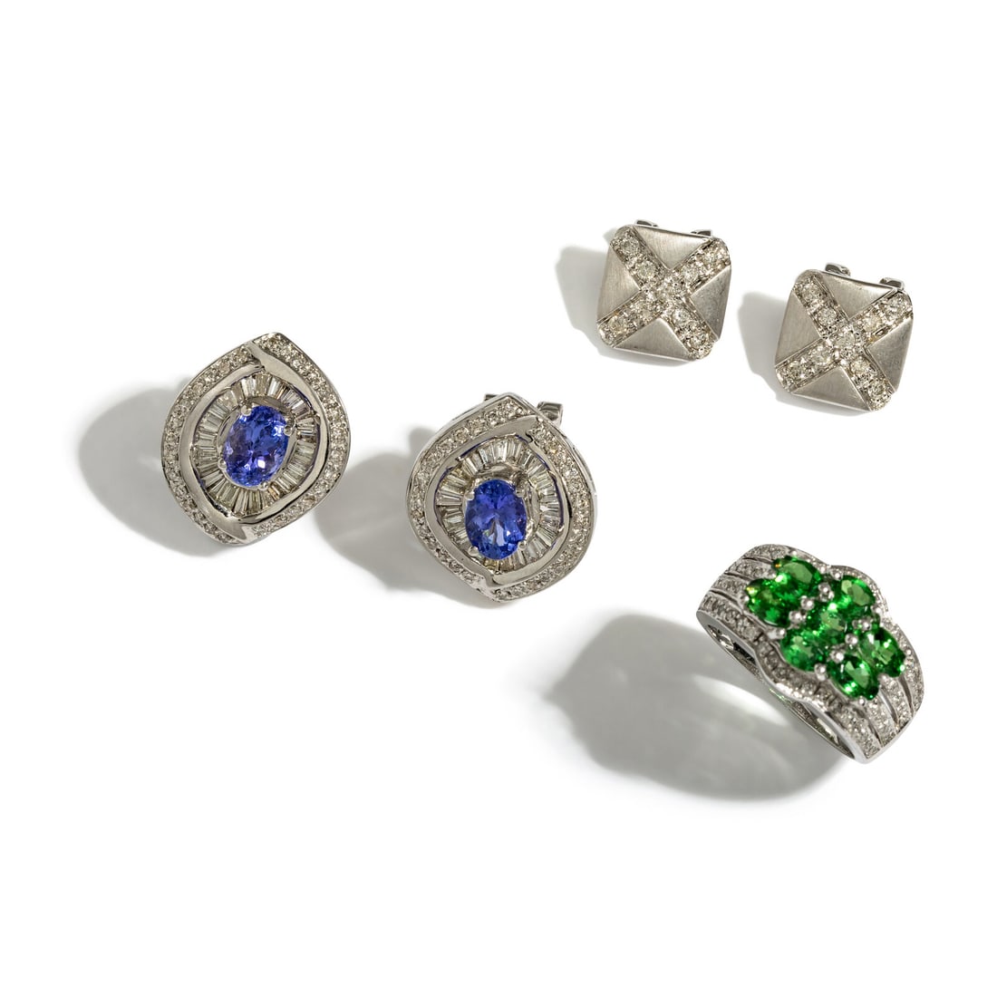 COLLECTION OF WHITE GOLD AND MULTIGEM JEWELRY: COLLECTION OF WHITE GOLD AND MULTIGEM JEWELRY Including one pair of earrings with an oval iolite, and round and tapered baguette diamonds weighing approximately 1.50 carats total, a ring with oval