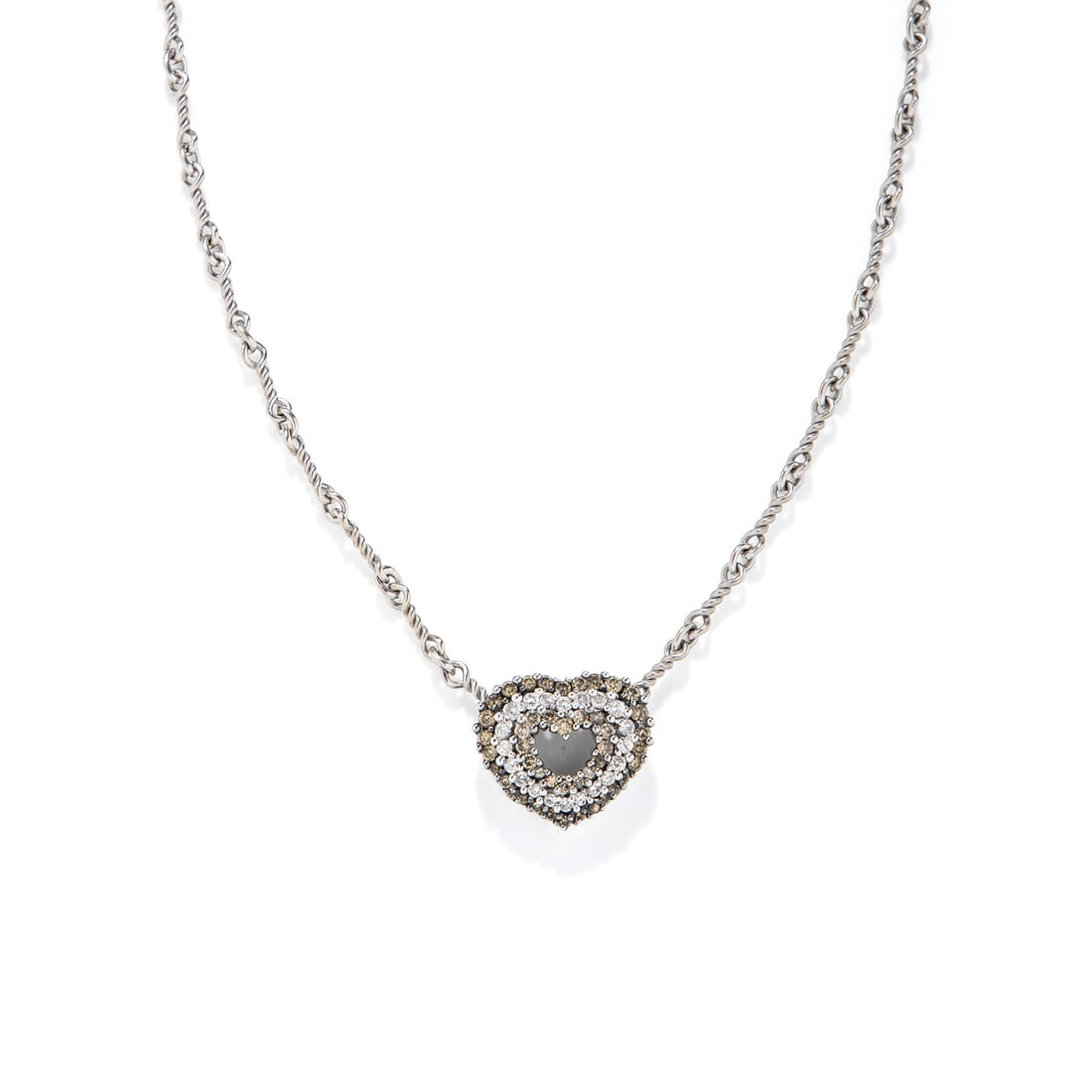 WHITE GOLD, DIAMOND, AND COLORED DIAMOND HEART NECKLACE: WHITE GOLD, DIAMOND, AND COLORED DIAMOND HEART NECKLACE Round diamonds and brown diamonds (origin of color not tested) weighing approximately 1.00 carat total. 14 karat white gold. 18 inches long.