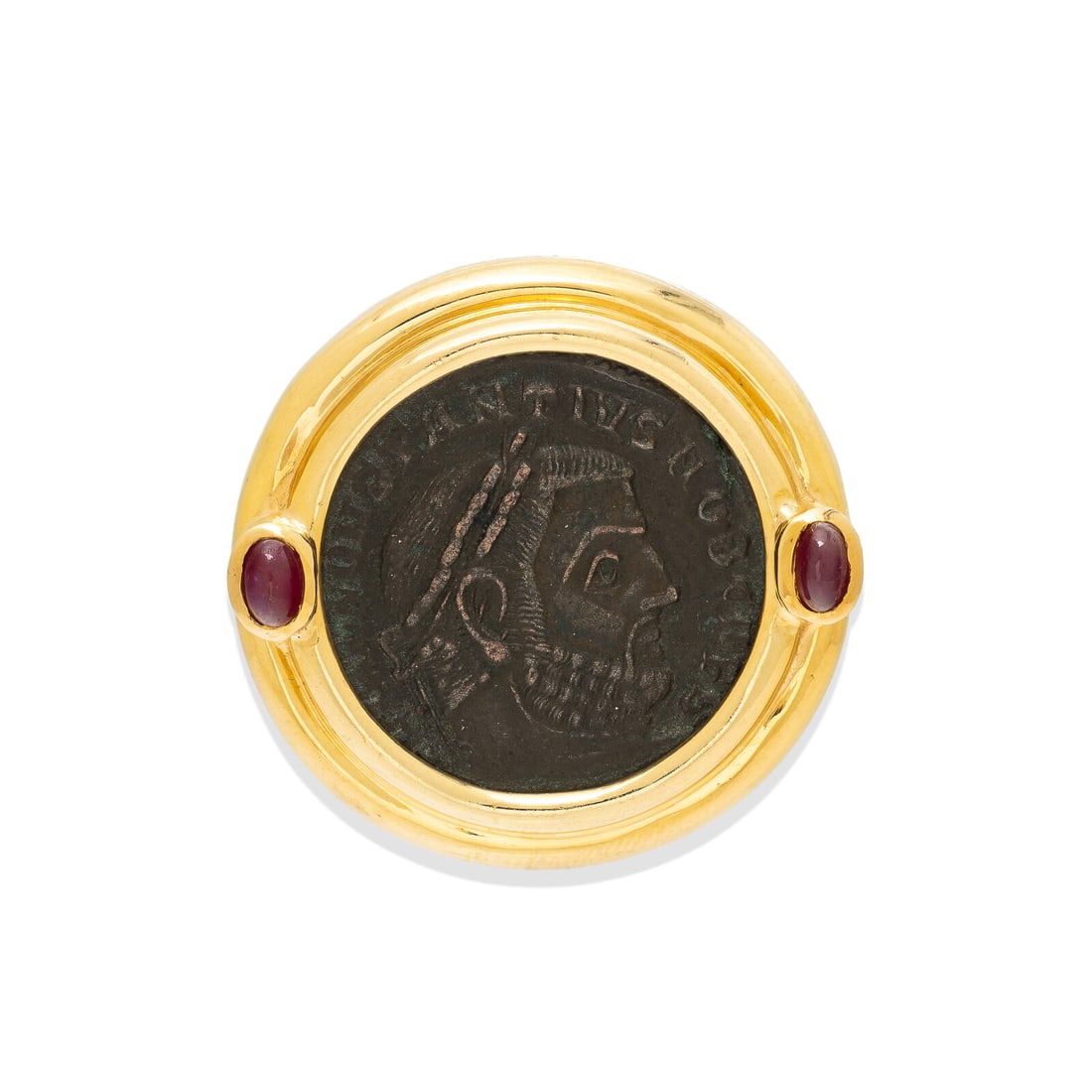 ANCIENT COIN, RUBY, AND YELLOW GOLD SLIDE PENDANT: ANCIENT COIN, RUBY, AND YELLOW GOLD SLIDE PENDANT Bronze follis coin of Emperor Constantius and oval cabochon rubies. 18 karat yellow gold. 1 1/4 x 1 1/4 inches. Stamp: 18K. Gross weight: 15.80 dwt. T