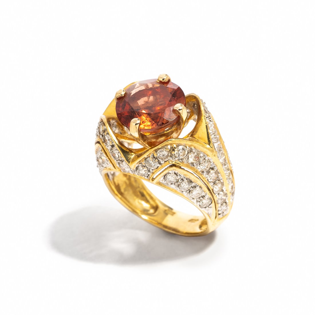 YELLOW GOLD, COLORED GEM, AND DIAMOND RING: YELLOW GOLD, COLORED GEM, AND DIAMOND RING Round pink orange gemstone measuring approximately 10.05 x 10.05 mm and round diamonds weighing approximately 1.45 carats total. 18 karat yellow gold. Ring s