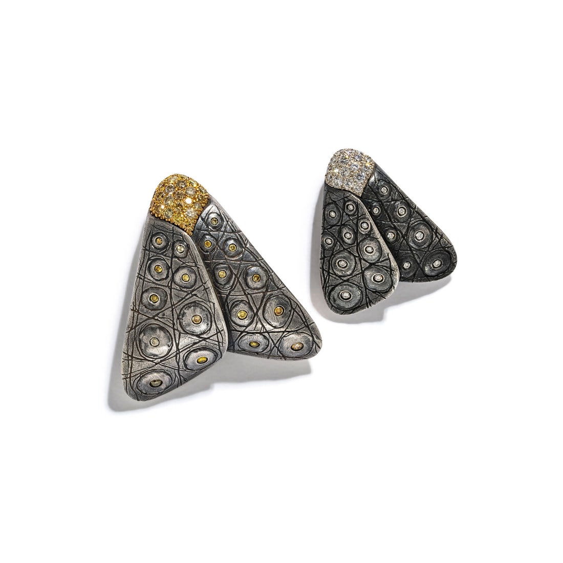 BOREGAARD, PAIR OF STERLING SILVER AND DIAMOND MOTH BROOCHES: BOREGAARD, PAIR OF STERLING SILVER AND DIAMOND MOTH BROOCHES Including two brooches designed as moths, the first set with round yellow diamonds (origin of color not tested) weighing approximately 0.90