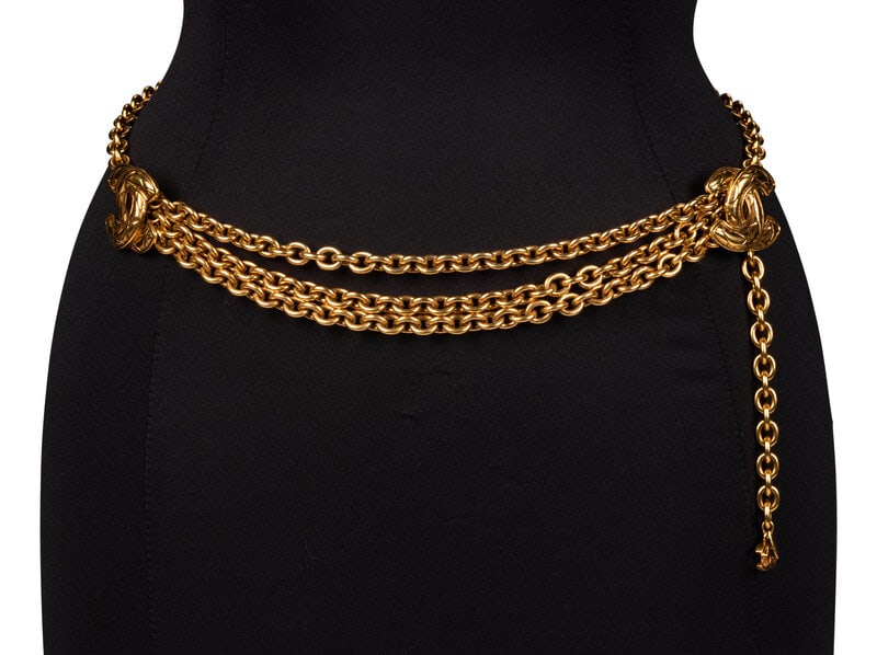 Chanel, CC Chain Belt: Chanel, CC Chain Belt Chain belt in gold-tone metal with quilted-effect CC charms and chain swags. Adjustable hook closure. Label: Chanel Date: 1980's Country of Origin: France Approximate