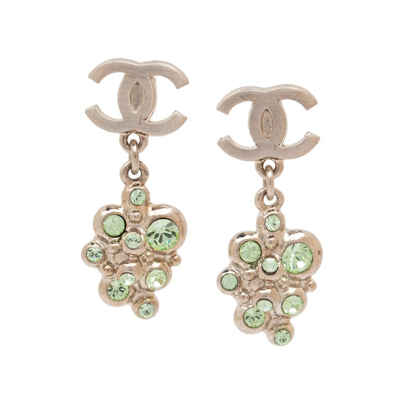 Chanel, CC & Rhinestone Drop Earrings: Chanel, CC & Rhinestone Drop Earrings Pair of CC logo drop earrings in silver-tone metal with pale green rhinestone-set dangling charms. Standard post backs. Label: Chanel Date: F/W 2005